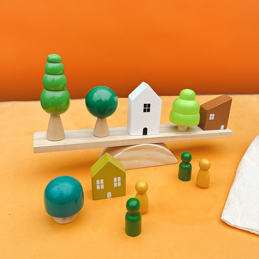 Child exploring a sensory play tray with natural materials, supporting tactile learning, focus and calm engagement in early childhood.